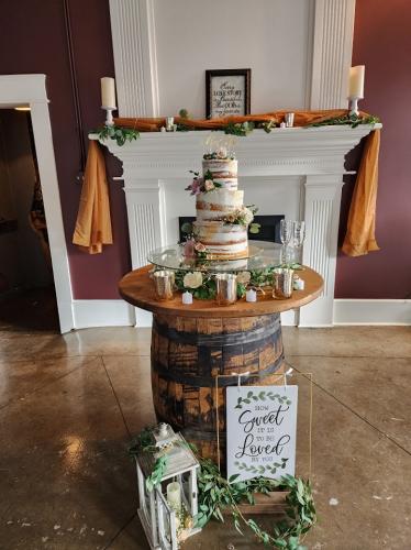 whiskey barrel wedding cake table