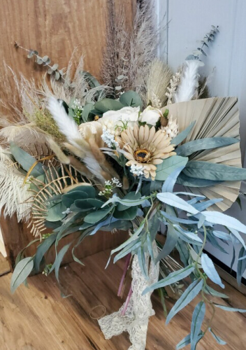 neutral bridal bouquet with pampas grass and feathers