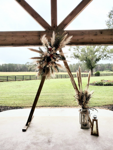 triangle wedding arch with pampas grass